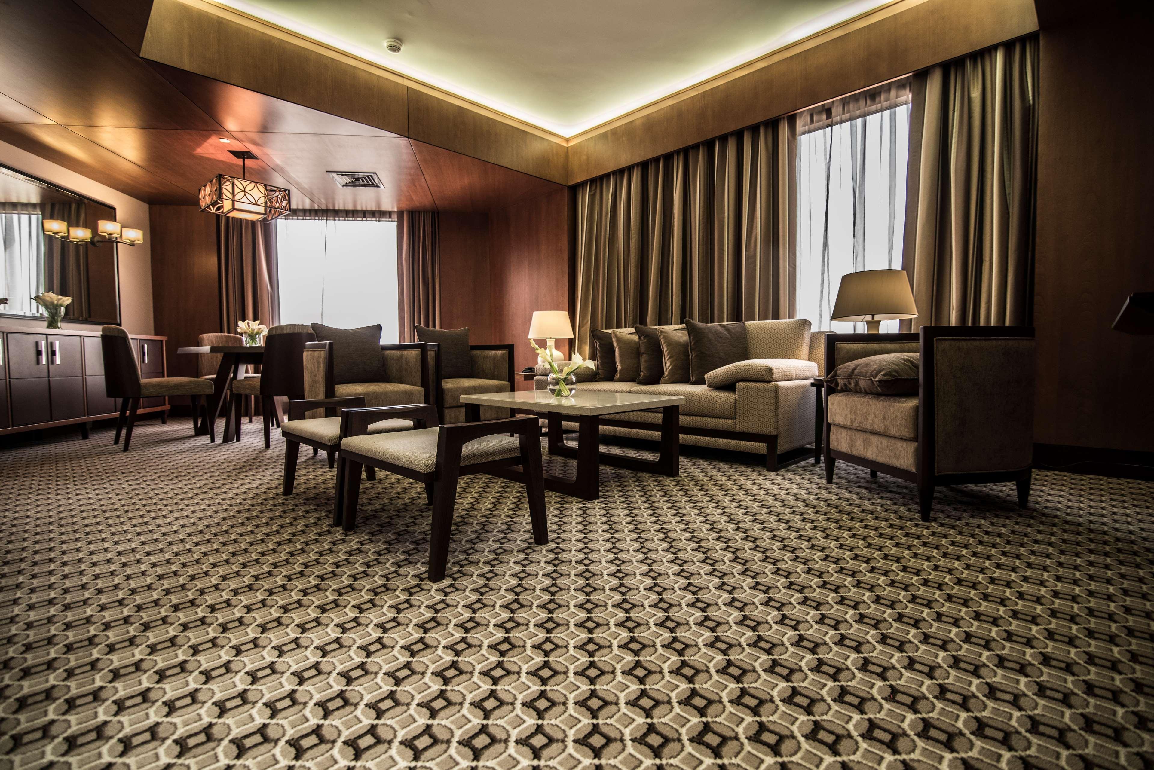 Ayla Grand Hotel al-Ain Exterior foto A carpet in a hotel